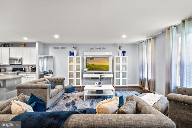 131 Time Cir, Bear, DE 19701 - living area featuring recessed lighting, visible vents, and dark wood-style floors