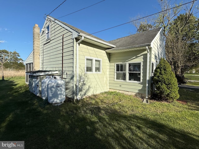4747 Tyaskin Rd, Tyaskin, MD 21865 - view of side of property with a lawn and a chimney
