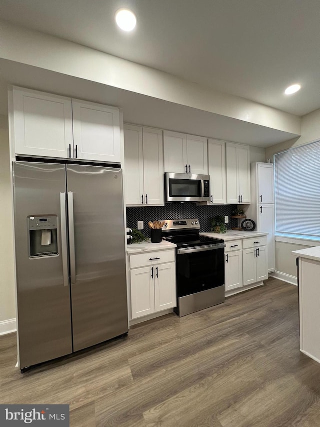 2452 Shirley Ave, Baltimore, MD 21215 - kitchen featuring appliances with stainless steel finishes, light countertops, and white cabinets
