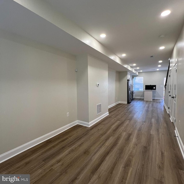2452 Shirley Ave, Baltimore, MD 21215 - empty room with dark wood-style flooring, visible vents, recessed lighting, and baseboards