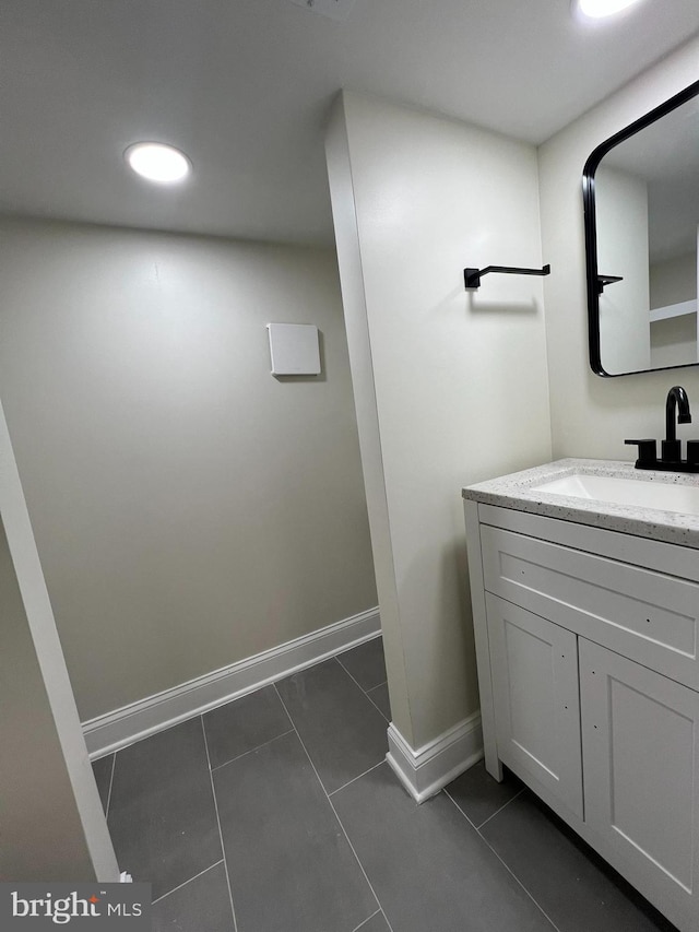 2452 Shirley Ave, Baltimore, MD 21215 - bathroom with vanity, recessed lighting, tile patterned flooring, and baseboards