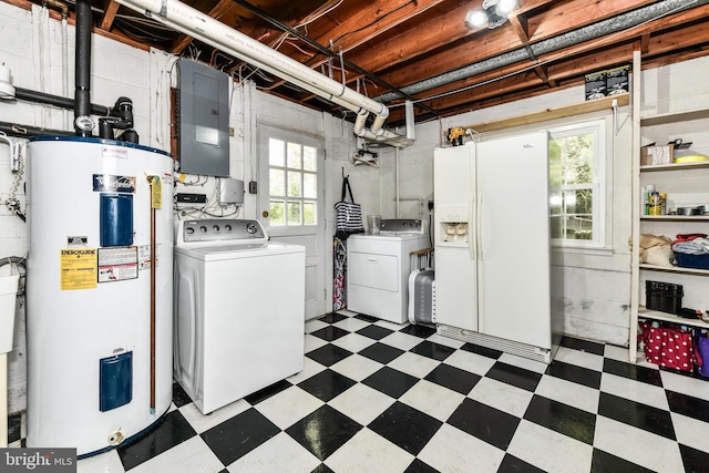 laundry area with electric panel, tile patterned floors, water heater, independent washer and dryer, and laundry area