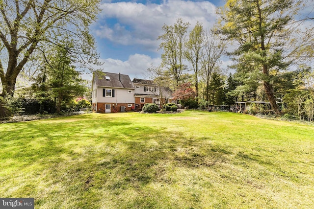 view of yard with fence
