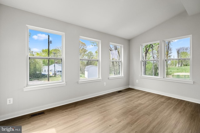 109 Hillsdale Dr, Fredericksburg, VA 22405 - spare room featuring wood finished floors and vaulted ceiling