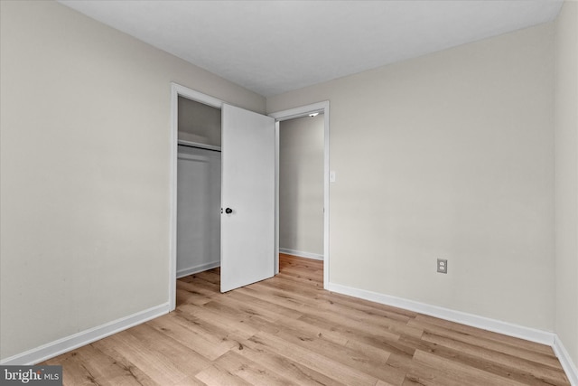 2300 Locust Rd, Dover, PA 17315 - unfurnished bedroom featuring wood finished floors, baseboards, and a closet