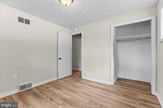 2300 Locust Rd, Dover, PA 17315 - unfurnished bedroom featuring wood finished floors, baseboards, and a closet