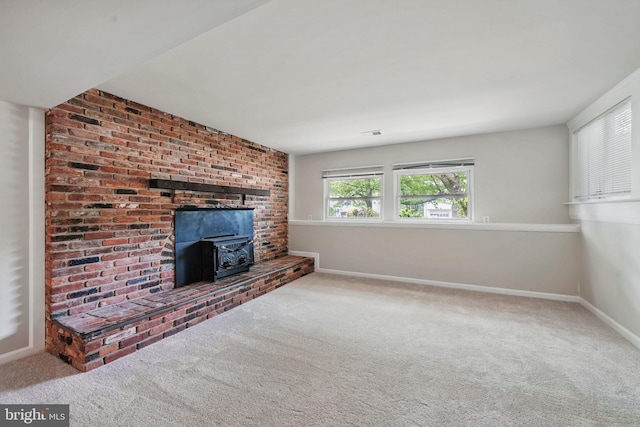 1258 Magnolia, Herndon, VA 20170 - unfurnished living room featuring a wood stove, carpet flooring, and baseboards