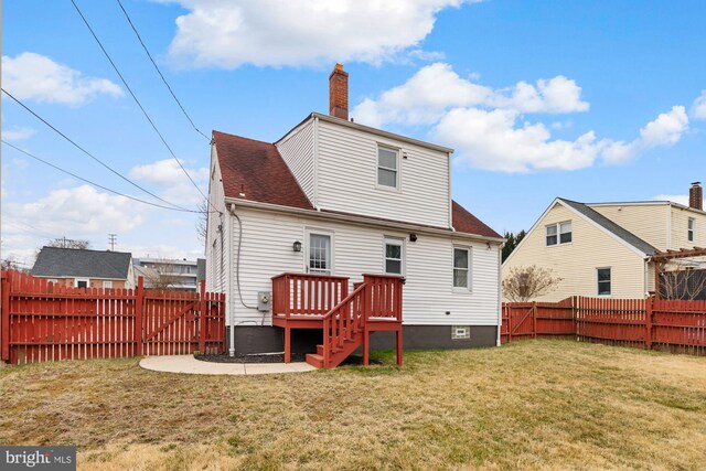 4 Cavan Dr, Lutherville Timonium, MD 21093 - back of house featuring a fenced backyard, roof with shingles, a yard, and a deck