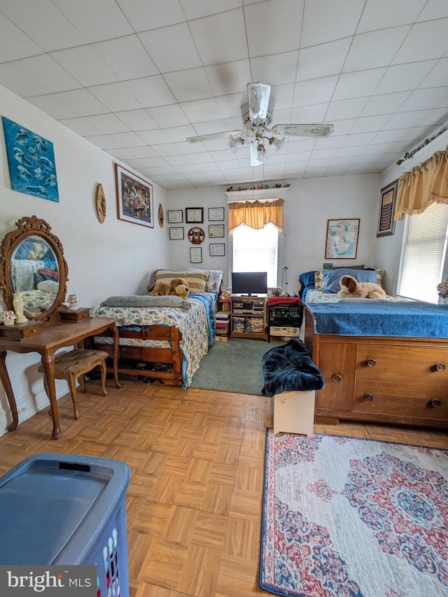 bedroom featuring multiple windows