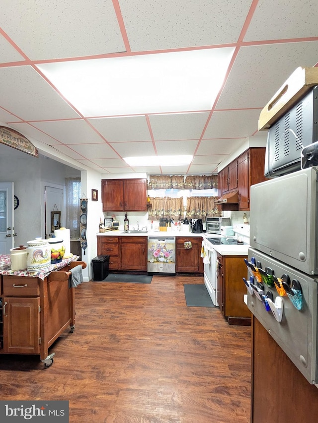 kitchen with stainless steel dishwasher, white range with electric stovetop, a paneled ceiling, and light countertops