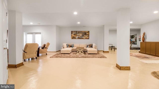 13002 Walkers Ln, Bowie, MD 20721 - living room with recessed lighting, baseboards, and finished concrete flooring