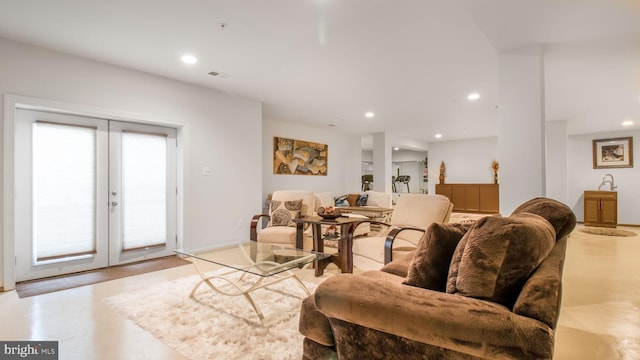 13002 Walkers Ln, Bowie, MD 20721 - living room featuring finished concrete flooring, french doors, and recessed lighting