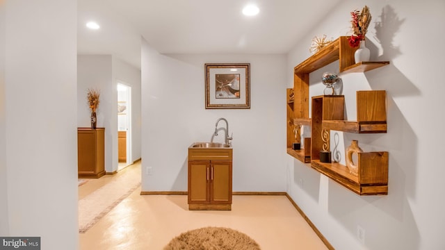 13002 Walkers Ln, Bowie, MD 20721 - corridor with a sink, baseboards, and recessed lighting