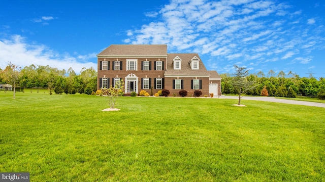 13002 Walkers Ln, Bowie, MD 20721 - view of front of property with an attached garage, concrete driveway, brick siding, and a front yard