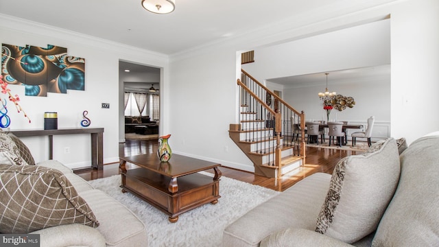 13002 Walkers Ln, Bowie, MD 20721 - living room with wood finished floors, stairway, baseboards, a notable chandelier, and ornamental molding