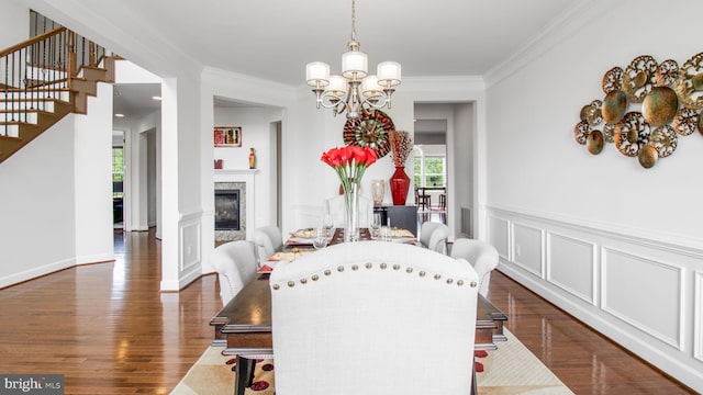 13002 Walkers Ln, Bowie, MD 20721 - dining room featuring an inviting chandelier, dark wood-type flooring, and crown molding