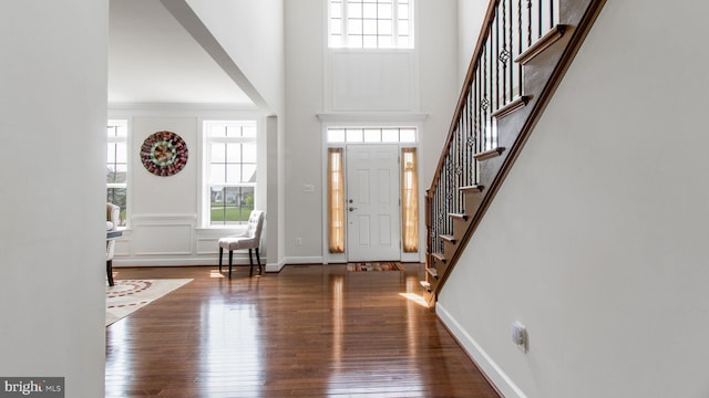 13002 Walkers Ln, Bowie, MD 20721 - entryway with stairs, a high ceiling, baseboards, and wood-type flooring