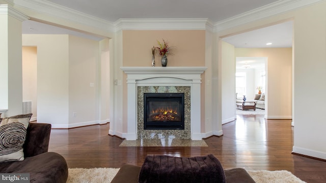13002 Walkers Ln, Bowie, MD 20721 - living area with baseboards, ornamental molding, wood finished floors, and a fireplace