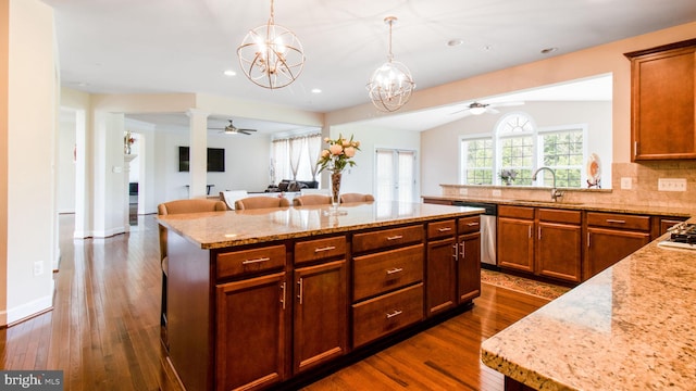 13002 Walkers Ln, Bowie, MD 20721 - kitchen featuring stainless steel dishwasher, ceiling fan with notable chandelier, dark wood-style floors, and open floor plan