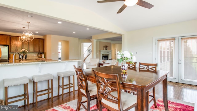 13002 Walkers Ln, Bowie, MD 20721 - dining area with recessed lighting, vaulted ceiling, french doors, and dark wood-type flooring