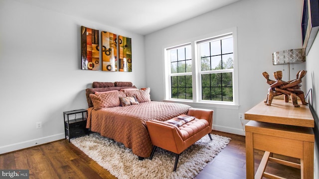 13002 Walkers Ln, Bowie, MD 20721 - bedroom featuring baseboards and dark wood-type flooring