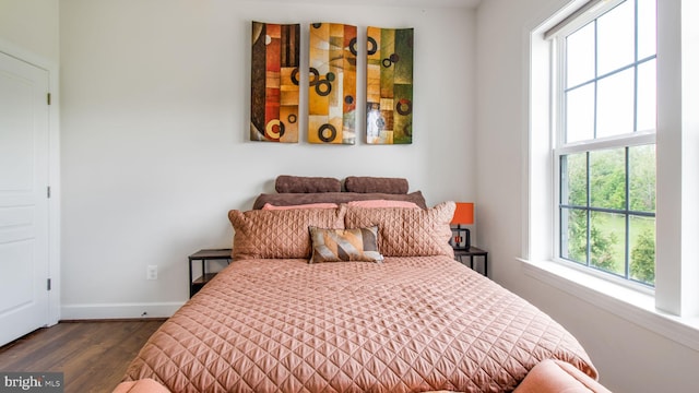 13002 Walkers Ln, Bowie, MD 20721 - bedroom with baseboards and dark wood-style floors