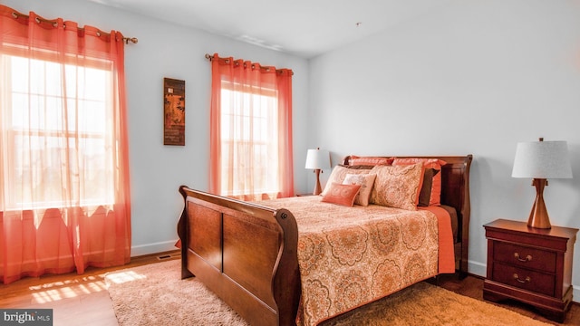 13002 Walkers Ln, Bowie, MD 20721 - bedroom with baseboards and wood finished floors