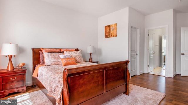 13002 Walkers Ln, Bowie, MD 20721 - bedroom with baseboards and wood finished floors