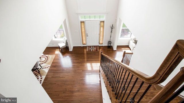 13002 Walkers Ln, Bowie, MD 20721 - foyer with a towering ceiling, stairs, wood finished floors, and a wealth of natural light