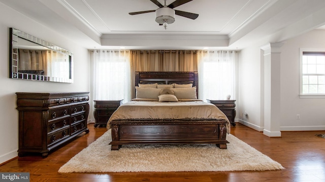 13002 Walkers Ln, Bowie, MD 20721 - bedroom with ornamental molding, a raised ceiling, and dark wood-style flooring