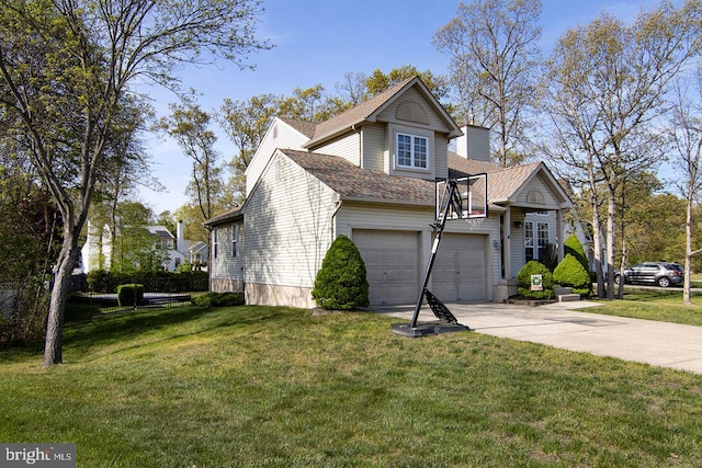 view of side of home featuring a shingled roof, a chimney, a yard, and driveway