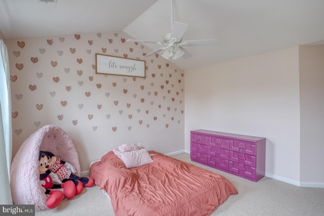 bedroom with wallpapered walls, vaulted ceiling, baseboards, and carpet