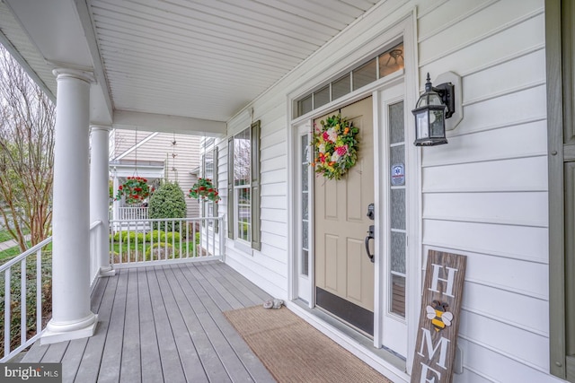wooden terrace featuring a porch