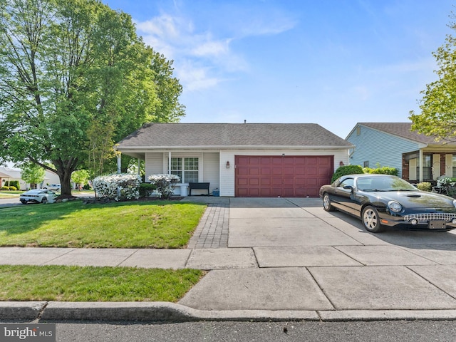 2 Windmill Ct, Columbus, NJ 08022 - view of front of home with an attached garage, driveway, and a front yard