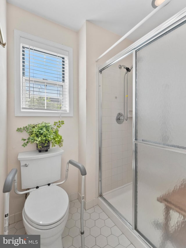 2 Windmill Ct, Columbus, NJ 08022 - bathroom featuring baseboards, tile patterned floors, and a shower stall