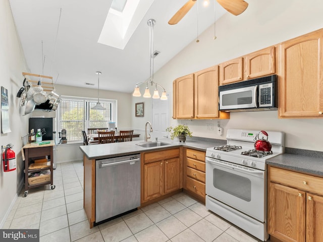 2 Windmill Ct, Columbus, NJ 08022 - kitchen featuring visible vents, a peninsula, a sink, light tile patterned floors, and stainless steel appliances