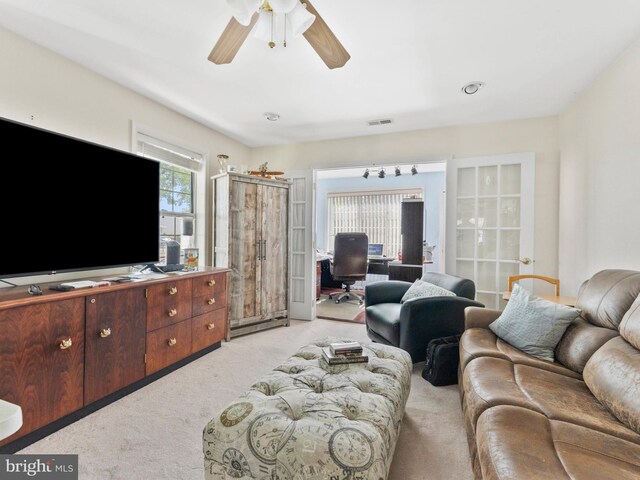 2 Windmill Ct, Columbus, NJ 08022 - living area featuring ceiling fan, light carpet, and visible vents