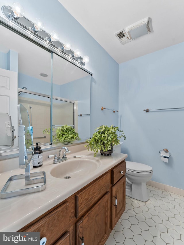 2 Windmill Ct, Columbus, NJ 08022 - bathroom featuring visible vents, tile patterned flooring, a stall shower, vanity, and toilet