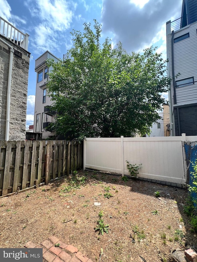 view of yard with fence