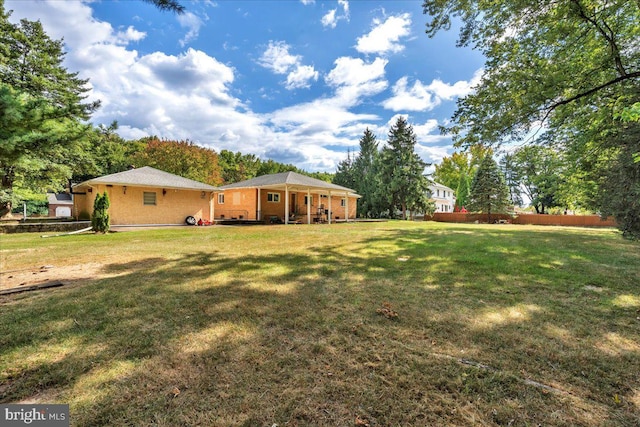 view of yard featuring fence