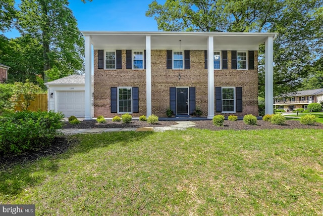 1399 Kimblewick Rd, Potomac, MD 20854 - greek revival house featuring a garage and brick siding