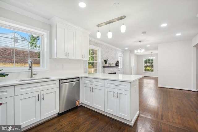1399 Kimblewick Rd, Potomac, MD 20854 - kitchen with stainless steel dishwasher, a sink, a peninsula, healthy amount of natural light, and recessed lighting