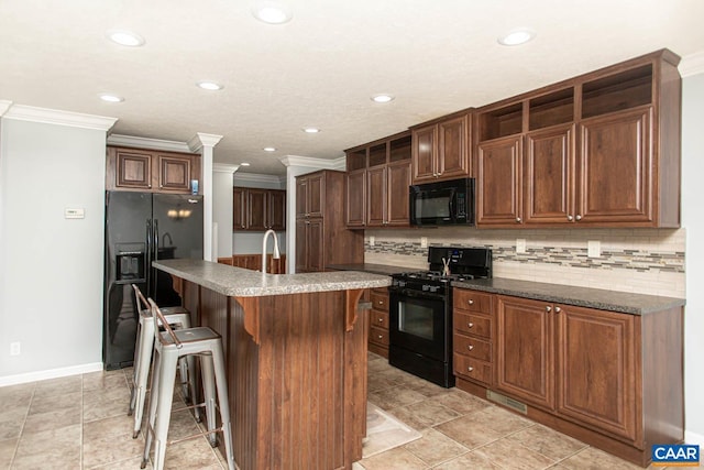 kitchen featuring backsplash, recessed lighting, ornamental molding, and black appliances