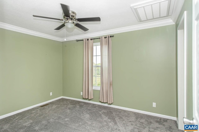 carpeted spare room featuring visible vents, crown molding, baseboards, and ceiling fan