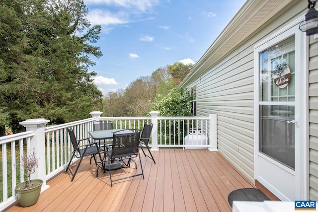 deck featuring outdoor dining space