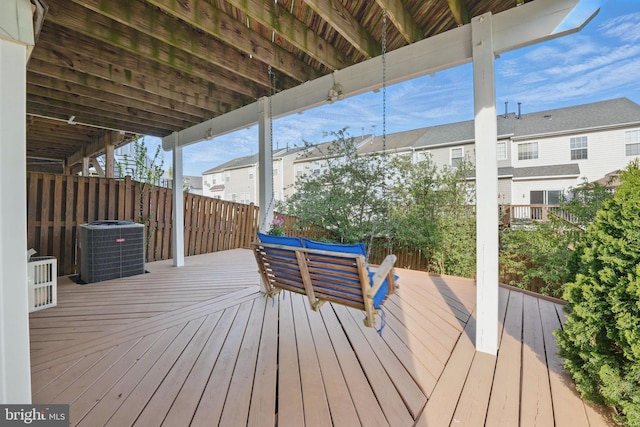 deck with cooling unit and a residential view