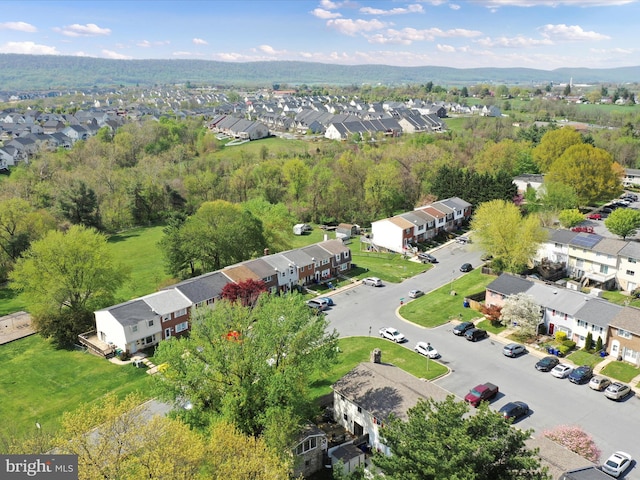 birds eye view of property with a residential view