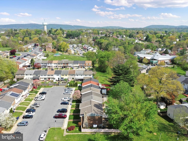 aerial view featuring a mountain view and a residential view