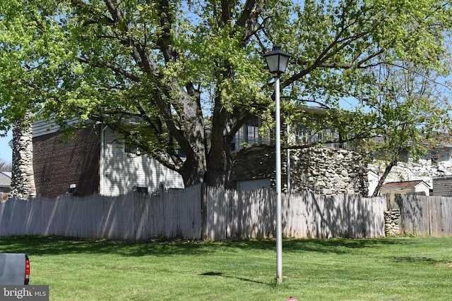 view of yard featuring fence