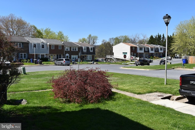 view of yard with a residential view